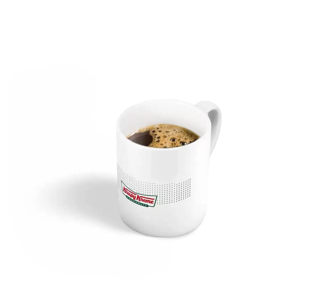 Café à Lausanne : Café Classique, Krispy Kreme, Un café équilibré aux notes gourmandes de noisettes et de caramel, préparé avec notre mélange BIO.